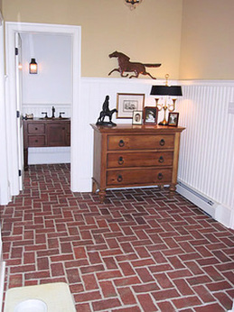 Brick tile herringbone entry hall
