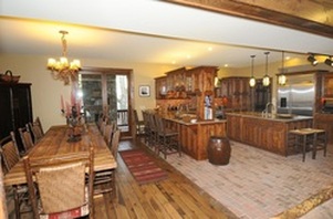 Brick and wood kitchen floor picture