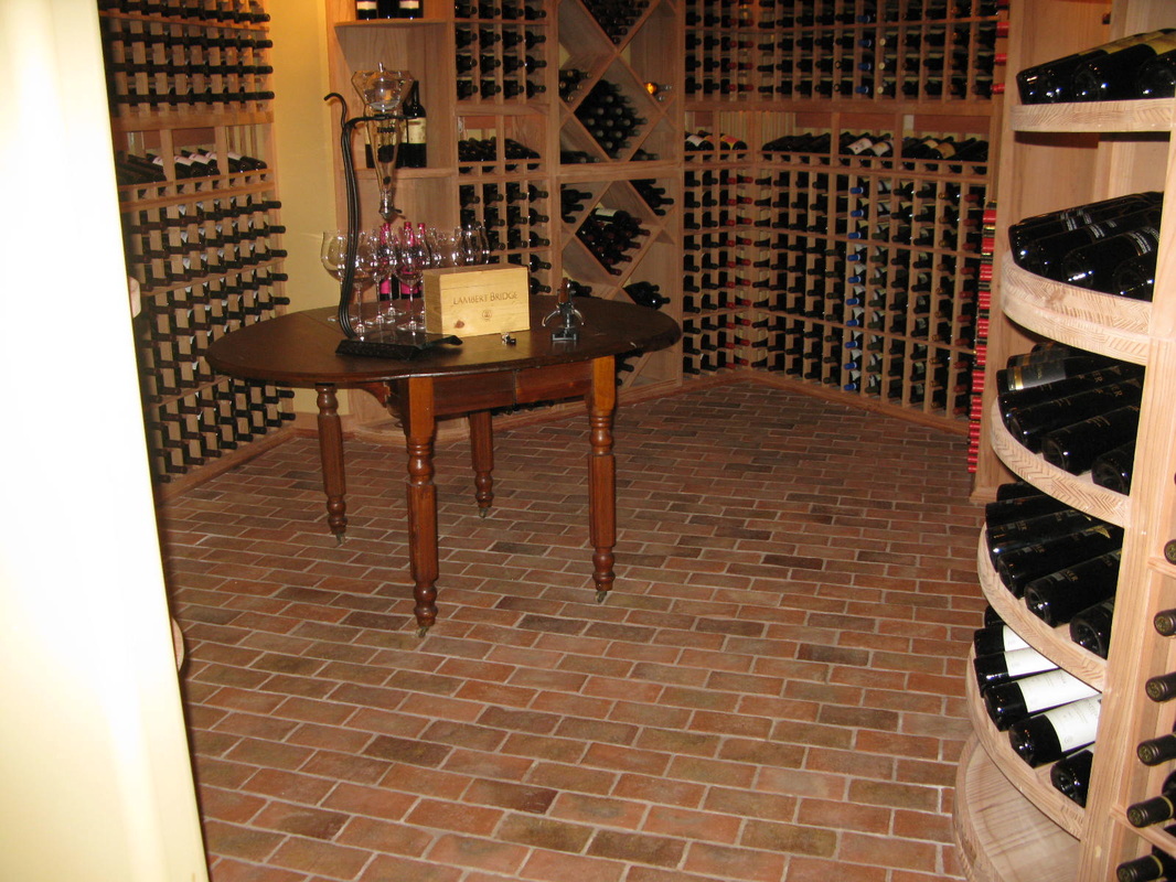 Picture brick tile floor in wine cellar 