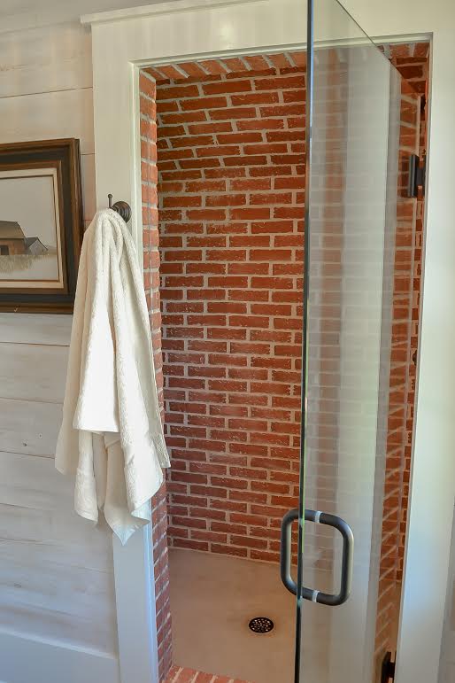 Exposed brick wall shower Lancaster Running Bond